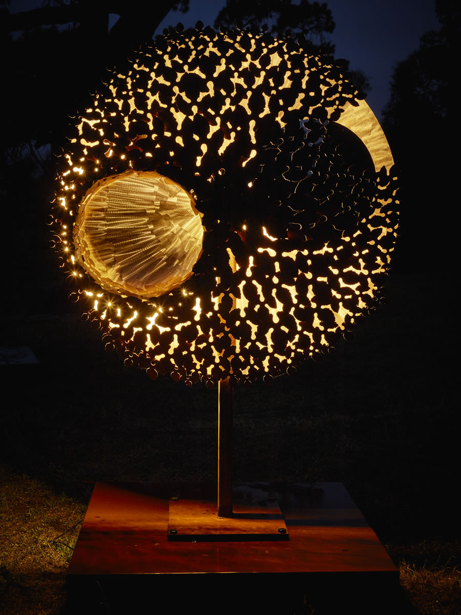 1.2m diameter, 2m tall, two sided corten/stainless steel with exterior LED lighting (side 2)