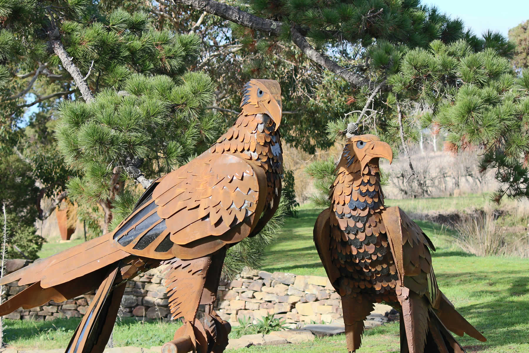 1.8m tall, corten steel/polyethylene