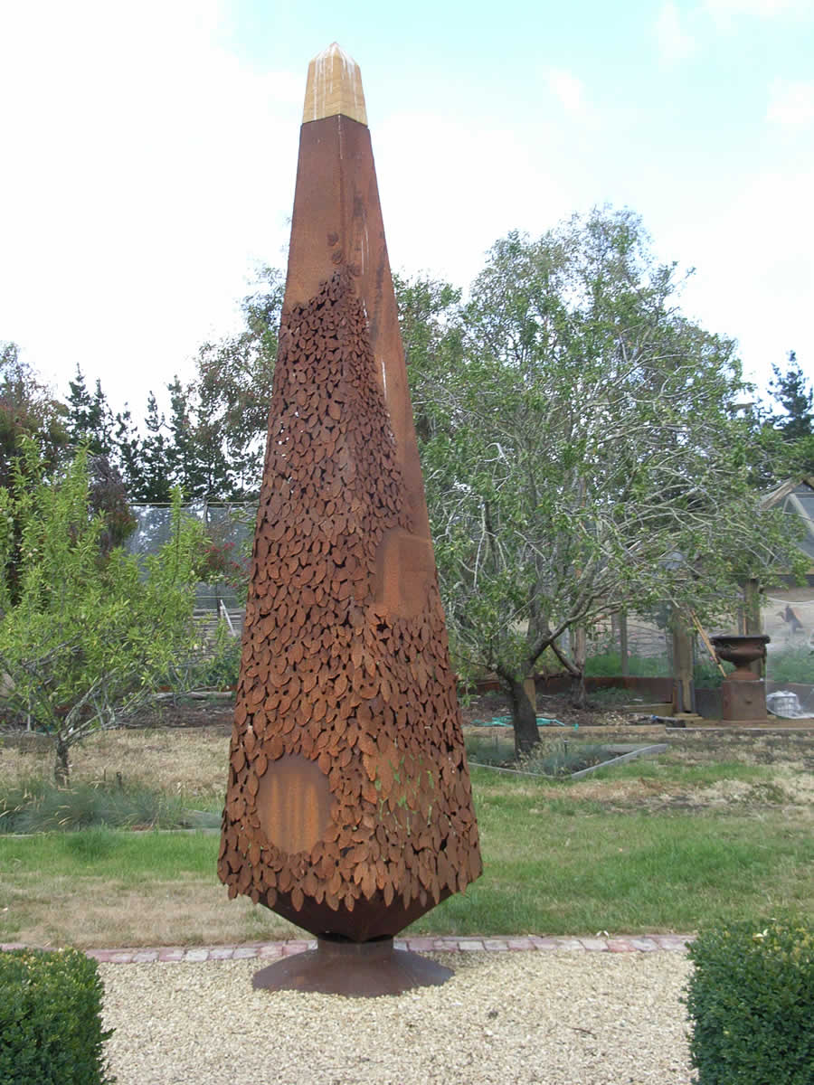 4m tall, corten steel/sandstone