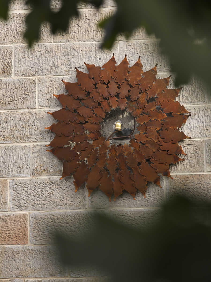 1.1m diameter, corten steel/gilded acorn