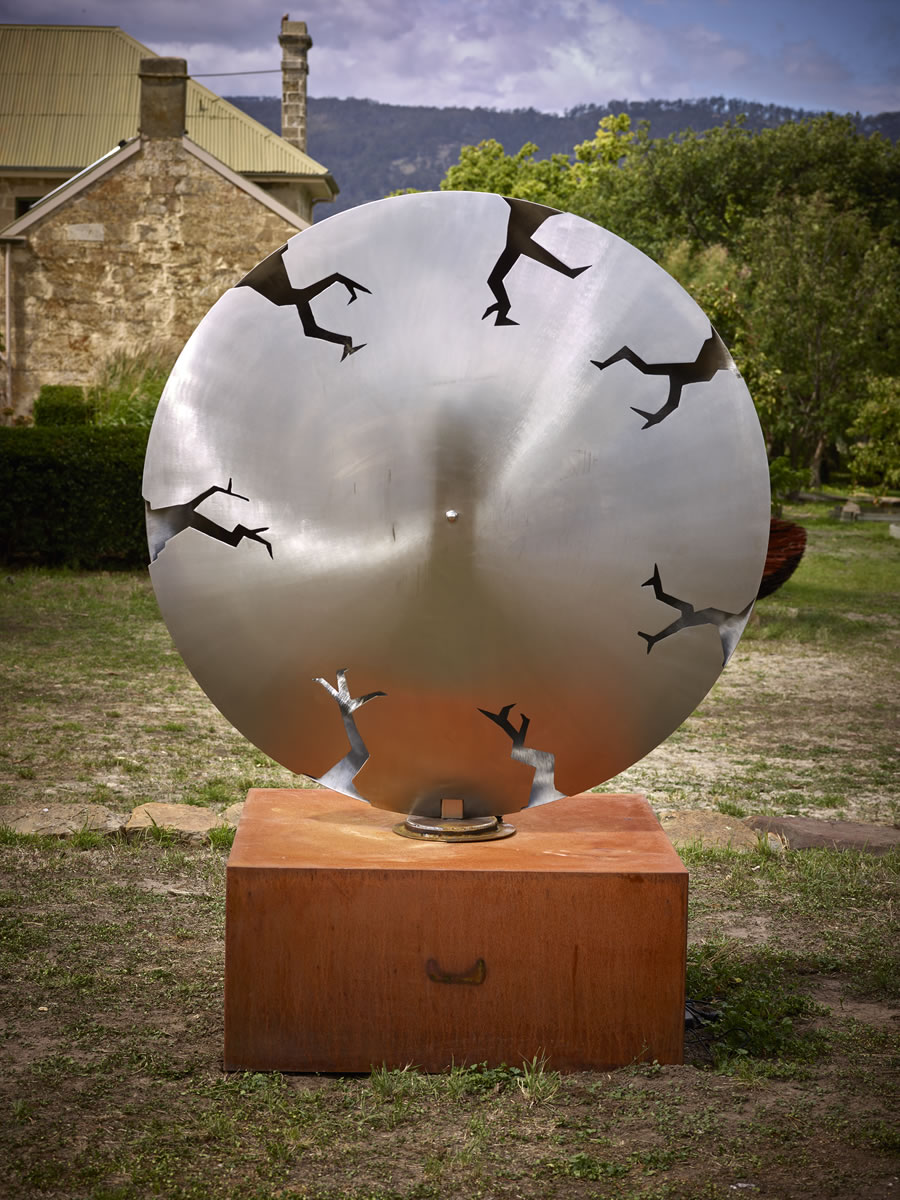 1.5m diameter, two sided stainless steel/corten steel/gold on swivel with exterior LED lighting (side 1)