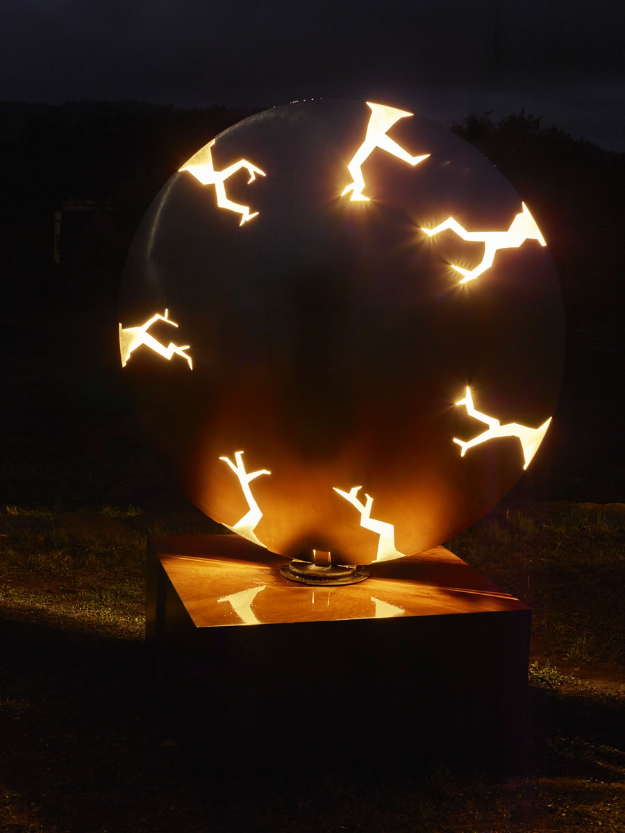 1.5m diameter, two sided stainless steel/corten steel/gold on swivel with exterior LED lighting (side 1)