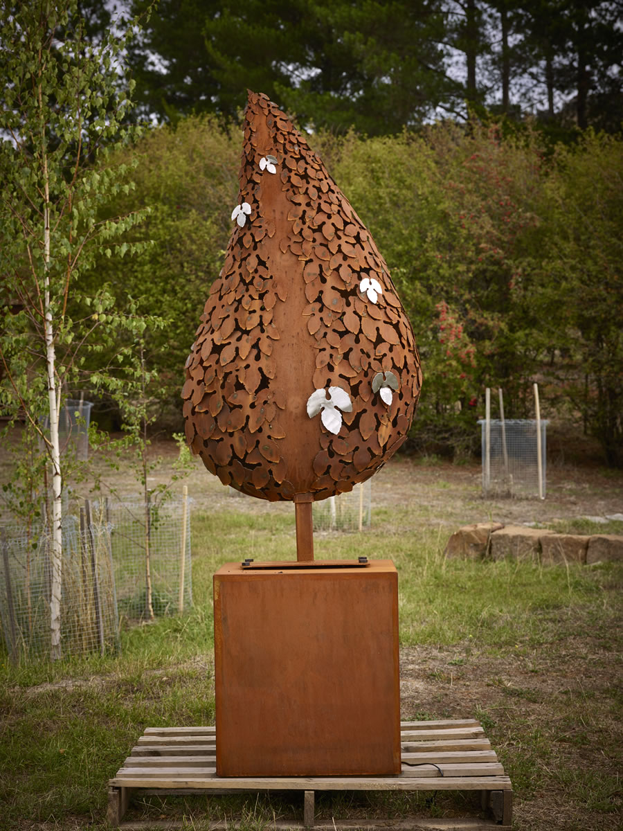 1.5m tall leaf, 2.2m tall, corten/stainless steel with exterior LED lighting
