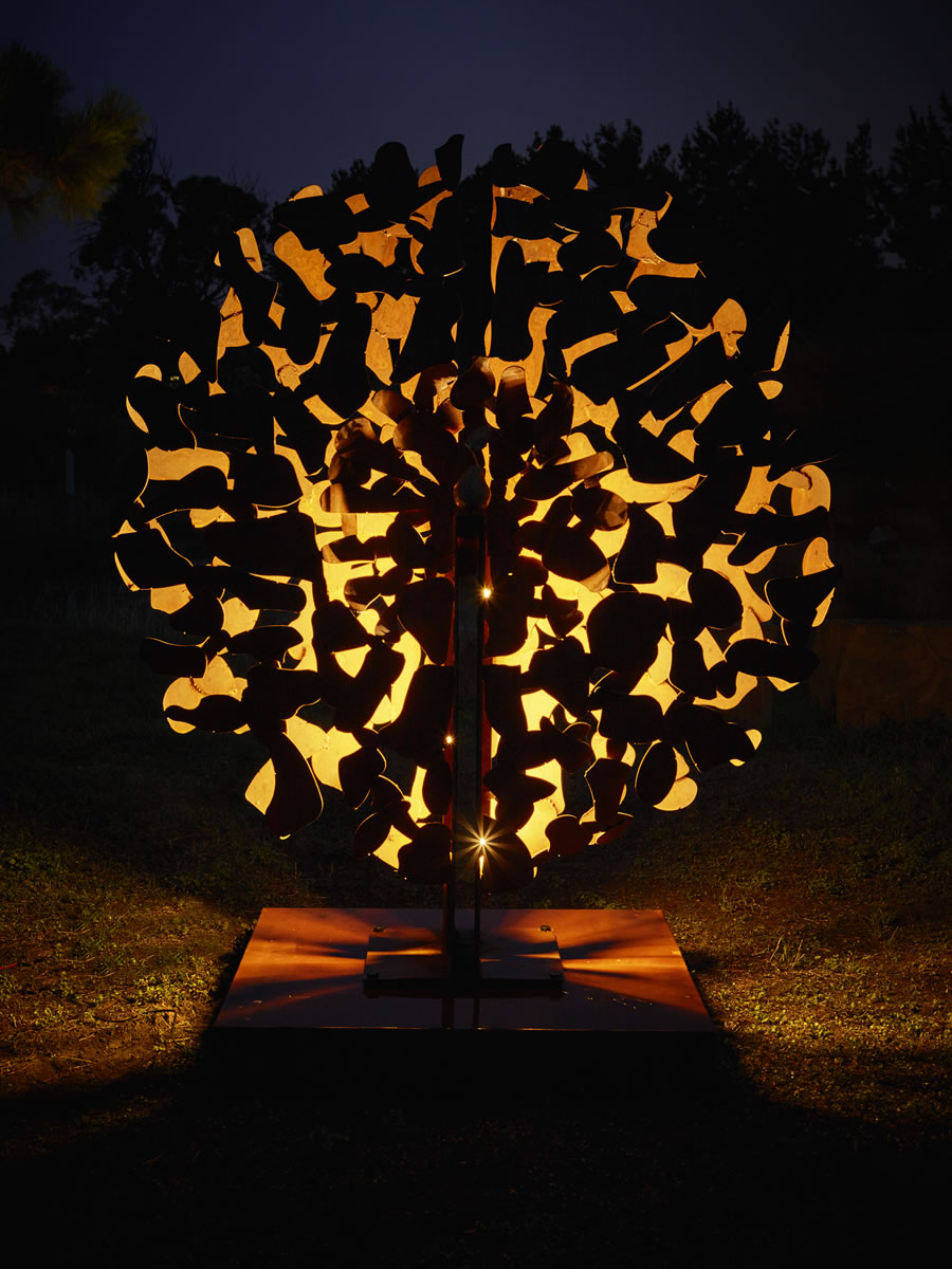 1.6m diameter, corten steel/bronze with exterior LED lighting