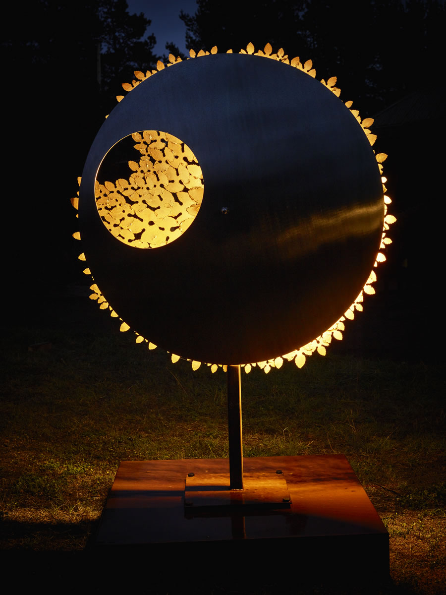 1.2m diameter, 2m tall, two sided corten/stainless steel with exterior LED lighting (side 1)
